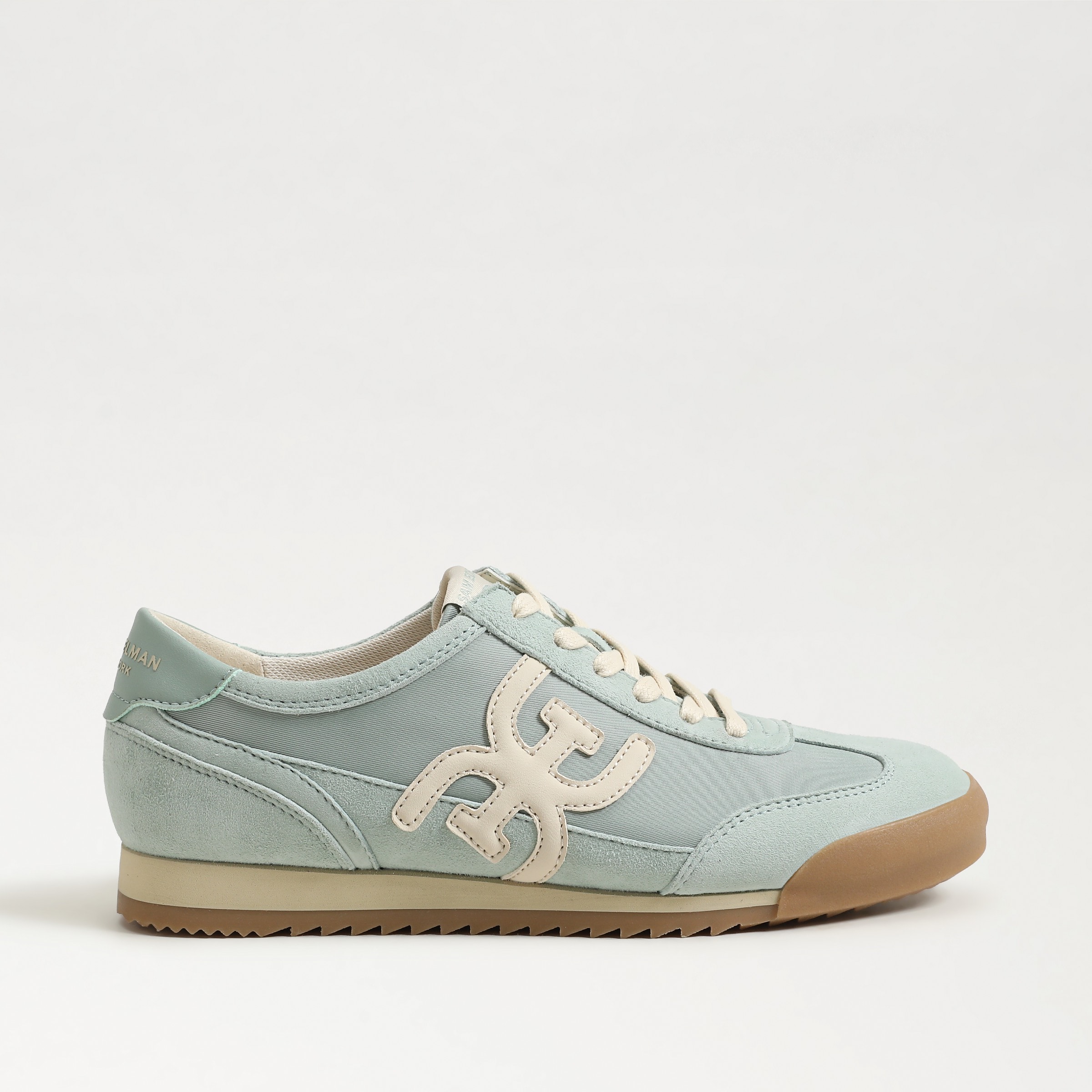 sneakers featuring the ivey sneaker in calypso mint and antique white