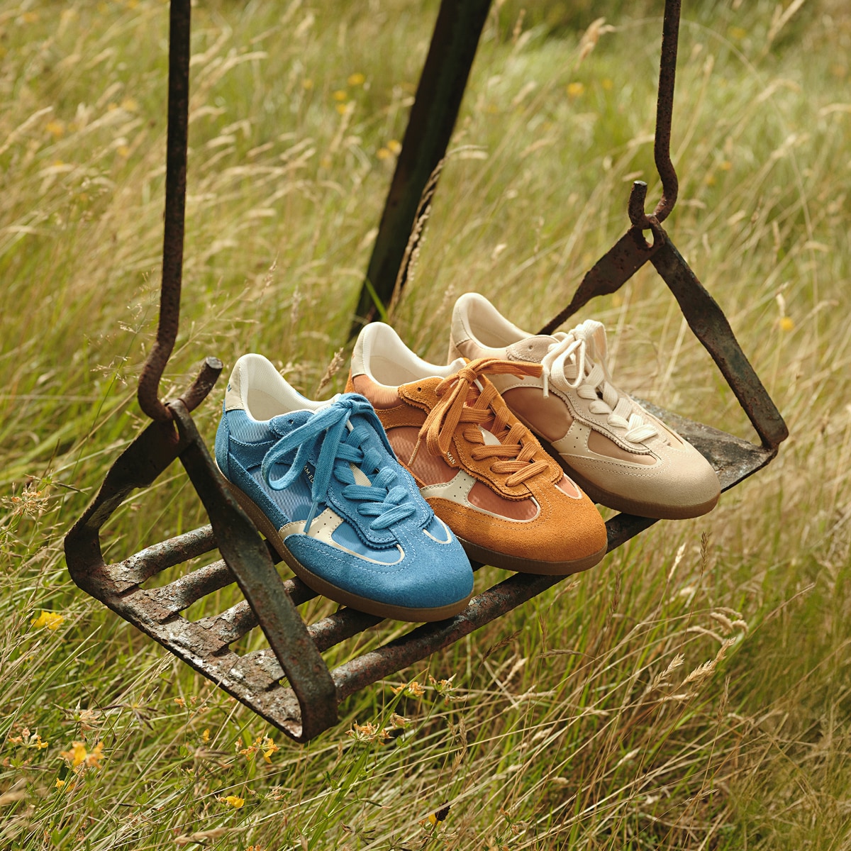 many colors of the kallen lace up sneaker including blue, orange, and tan
