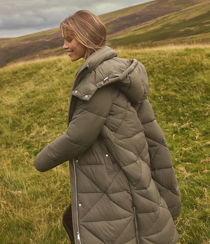 apparel featuring a woman wearing the Mix Quilted Maxi Puffer