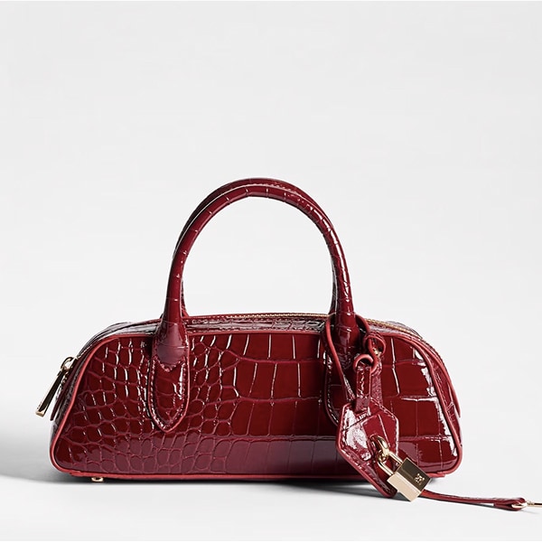 nori micro bowler satchel handbag in the color bordeaux