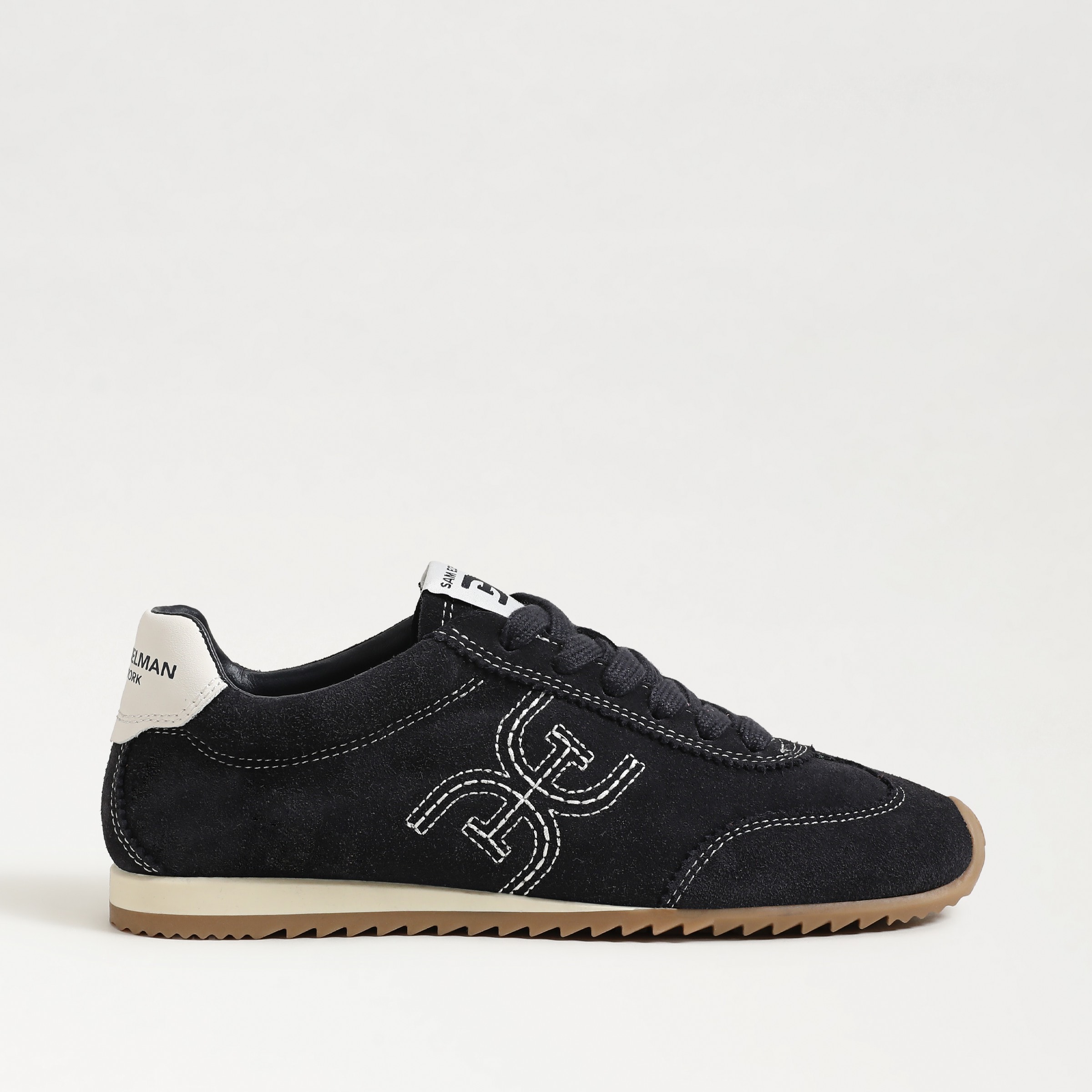 sneakers featuring the isella sneaker in midnight blue