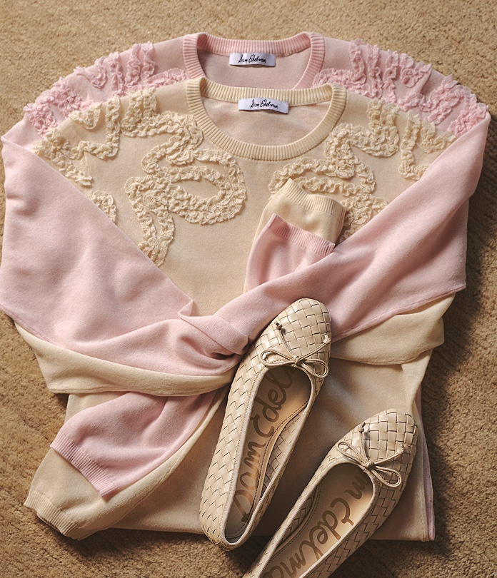 apparel featuring two sweaters, one pink, one taupe
