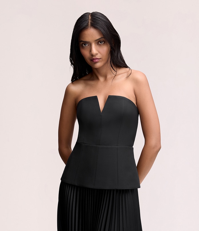 woman wearing a black strapless top