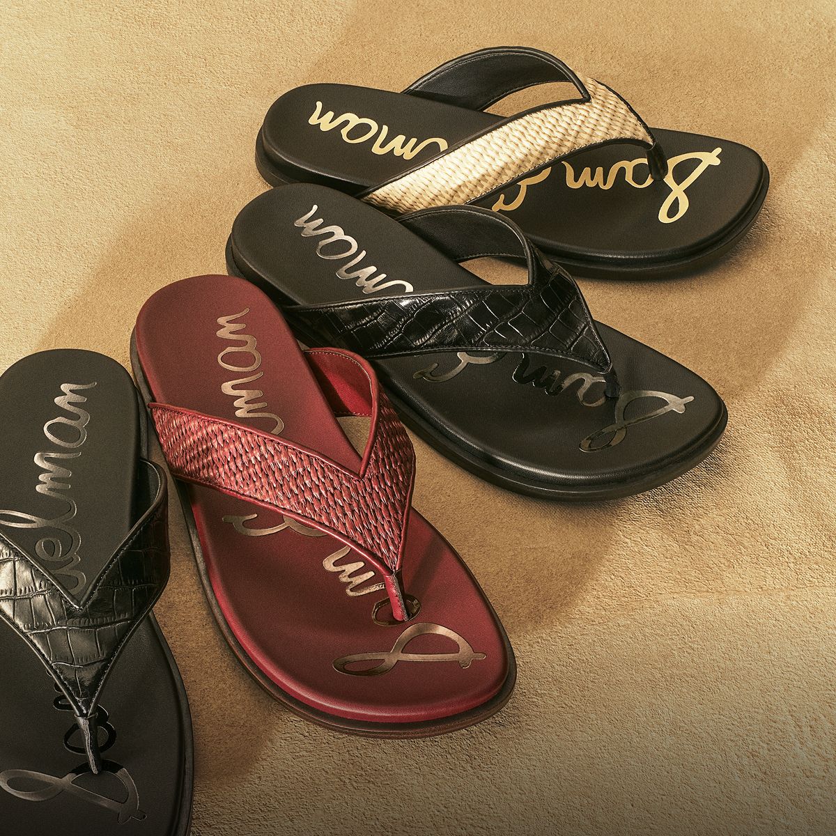 Four Sam Edelman Lila Flip Flop Sandals in brick faux raffia, black croco leather, and black faux raffia.