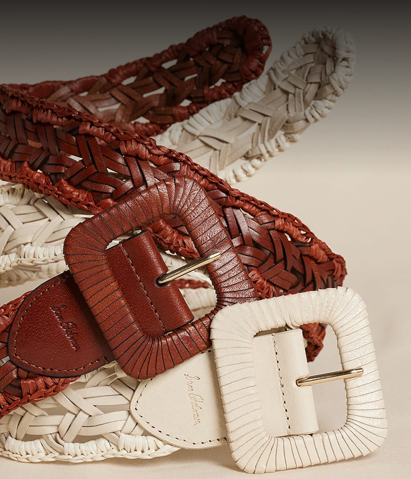 Braided leather belts with leather-wrapped square buckles in brown and cream.