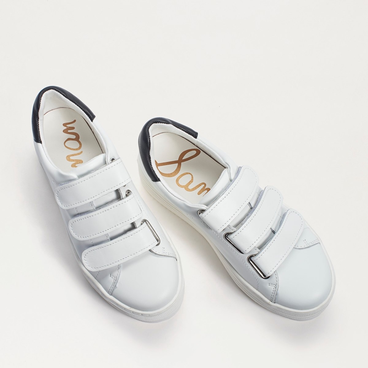 white velcro sneakers