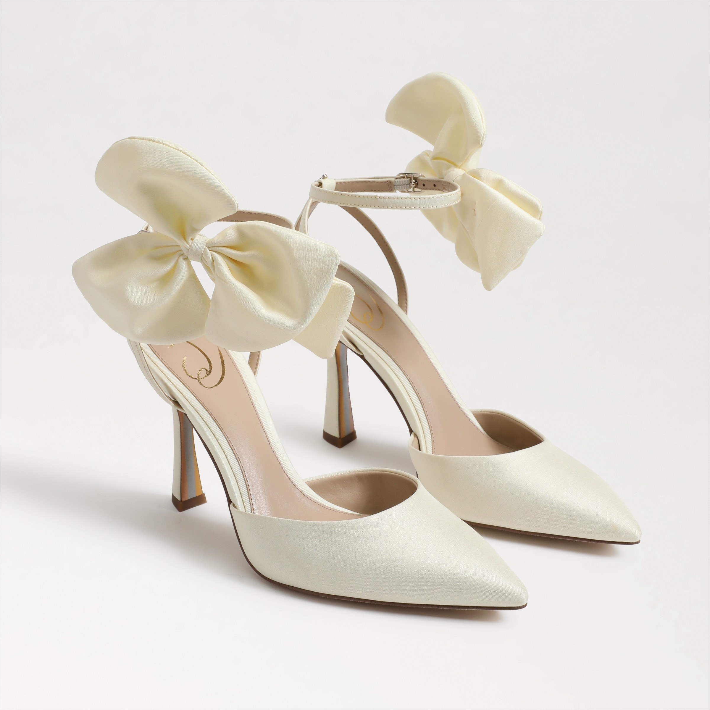 Ivory bow heels deals